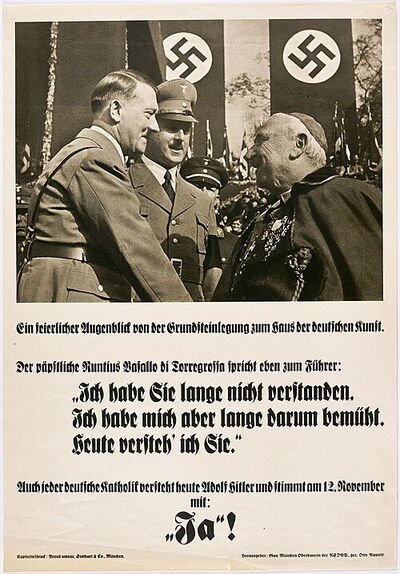 Nationalsozialistisches Propagandaplakat mit einem Foto von Adolf Hitler und Text in Frakturschrift